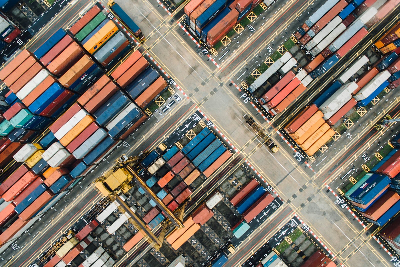 Aerial view of shipping containers at a logistics terminal